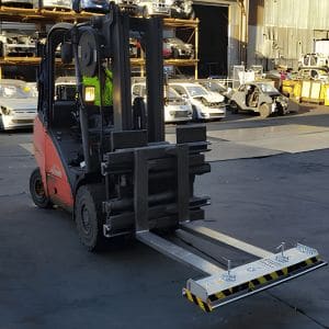 Italian-made Bergamini Vera 130 permanent forklift magnet mounted on Toyota forklift in scrap yard